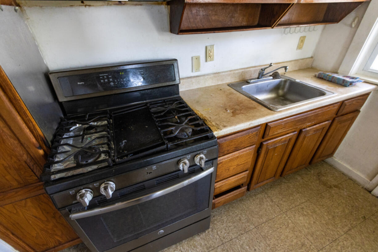 A kitchen in need renovation is seen at the Lexington Gardens public housing complex in Watertown, Mass., on Aug. 2, 2023. A WBUR and ProPublica investigation found that nobody is living in nearly 2,300 state-funded apartments, with most sitting empty for months or years. The state pays local housing authorities to maintain and operate the units whether they're occupied or not.