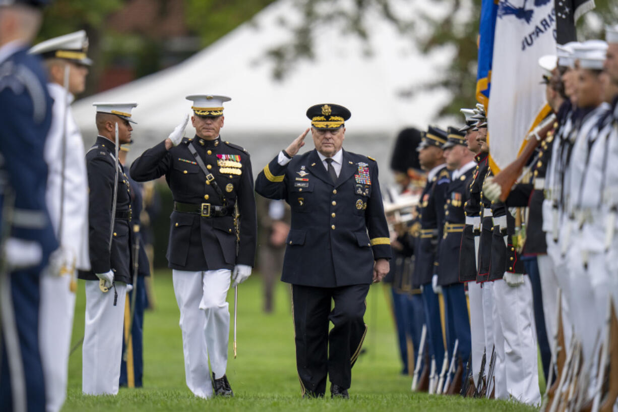 Col. Robert Sucher, Commander 8th and I, Marine Barracks Washington, left, and Joint Chiefs Chairman Gen. Mark Milley salute during an inspection of the troops during an Armed Forces Farewell Tribute in honor of Joint Chiefs Chairman Gen. Mark Milley at Joint Base Myer-Henderson Hall, Friday, Sept. 29, 2023, in Fort Meyer, Va. Also held was an Armed Forces Hail in honor of Gen. CQ Brown, Jr., who the Senate confirmed as the next chairman of the Joint Chiefs of Staff.