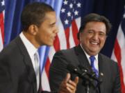 FILE - President-elect Barack Obama and Commerce Secretary designate New Mexico Gov. Bill Richardson laugh after a question was asked about Richardson's beard, Wednesday, Dec. 3, 2008, during a news conference in Chicago.  Richardson, a two-term Democratic governor of New Mexico who later was the U.S. ambassador to the United Nations and dedicated his post-political career to working to free Americans detained overseas, has died, Saturday, Sept. 2, 2023.