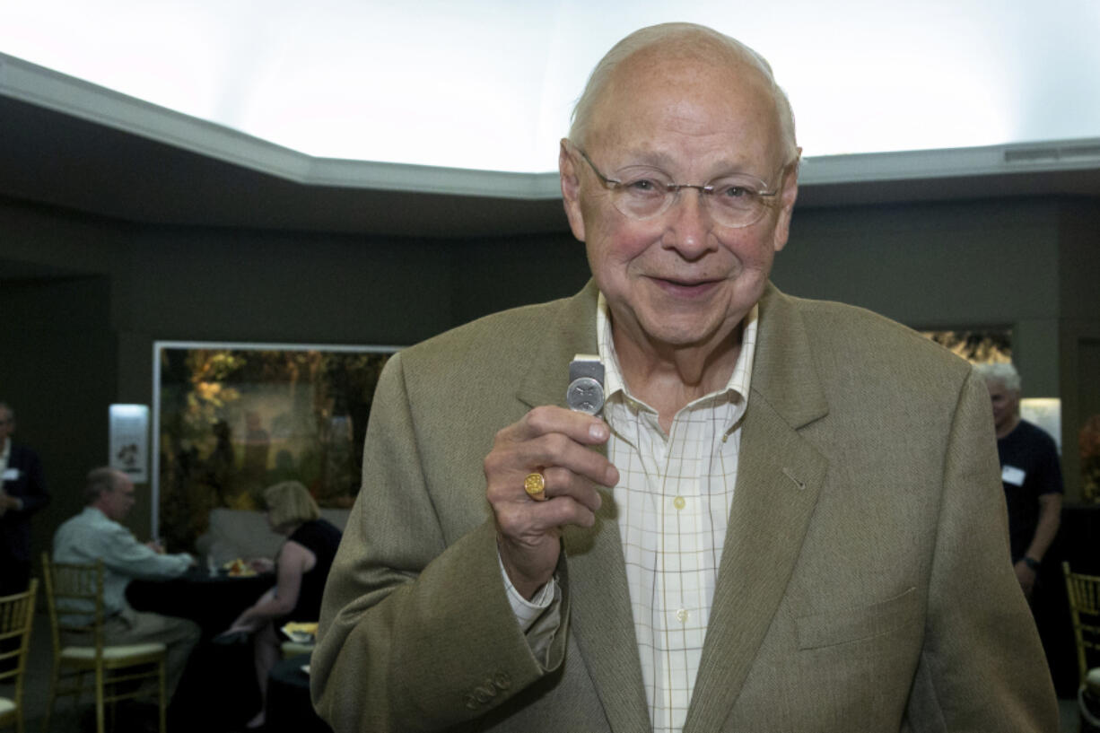 Dr. Richard Moriarty, creator of Mr. Yuk, shows his Mr. Yuk money clip at Carnegie Museum of Natural History, Botany Hall, Thursday, June 1, 2023, in Oakland, Pa. Moriarty passed away on Thursday, Sept. 7, according to Jeffrey Fugh of the funeral home John A. Freyvogel Sons Inc., which is handling arrangements in Pittsburgh.