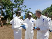 Washington State University’s Kariuki Njenga, center, and Tom Kawula, right, consult with colleagues Arithi Mutembei, left, and Boru Wato, right, as they do field work in Marsabit County in 2018.