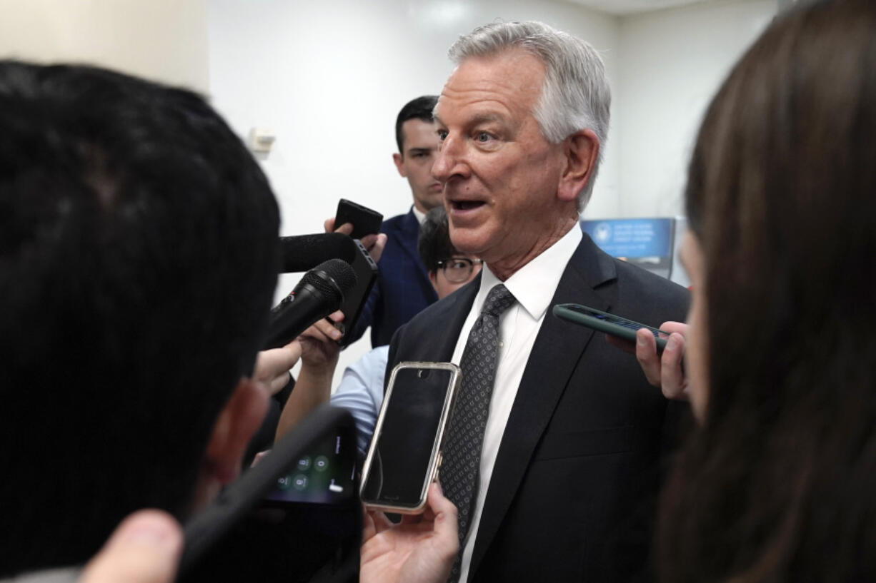 Sen. Tommy Tuberville, R-Ala., a member of the Senate Armed Services Committee, speaks with reporters near the Senate Subway on Capitol Hill Wednesday, Sept. 6, 2023, in Washington.