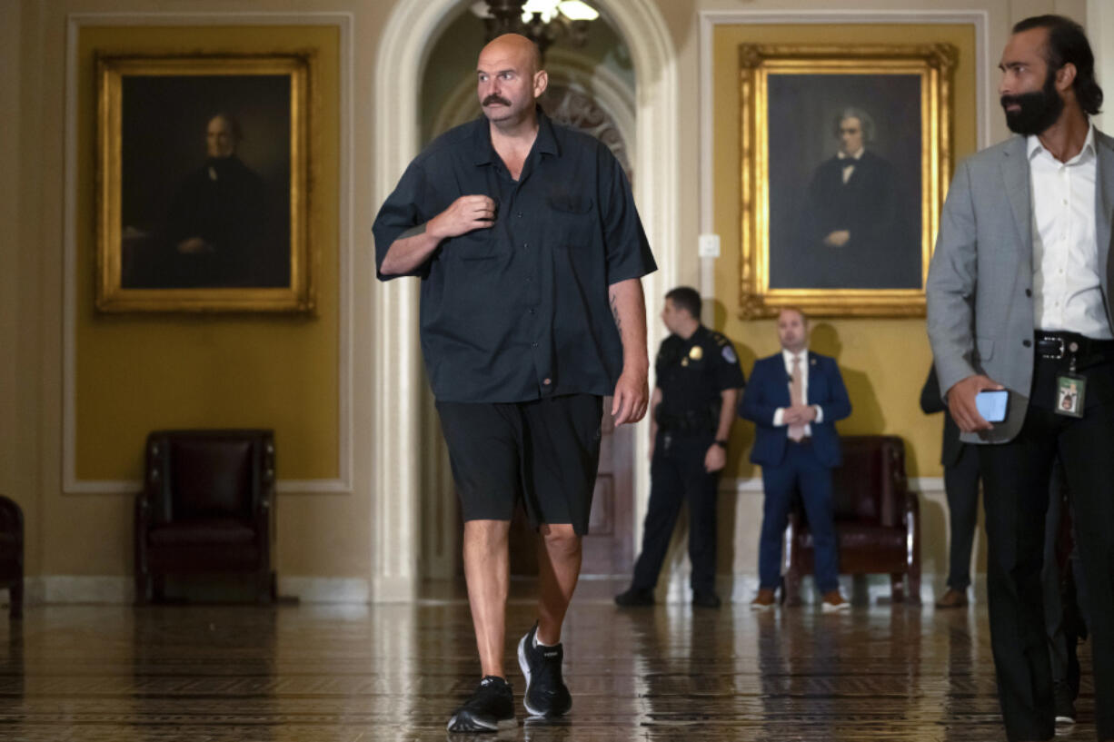 Sen. John Fetterman, D-Pa., walks on Capitol Hill on Thursday, Sept. 21, 2023, in Washington.