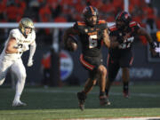 Oregon State running back Damien Martinez rushes against UC Davis during the first half of an NCAA college football game Saturday, Sept. 9, 2023, in Corvallis, Ore.