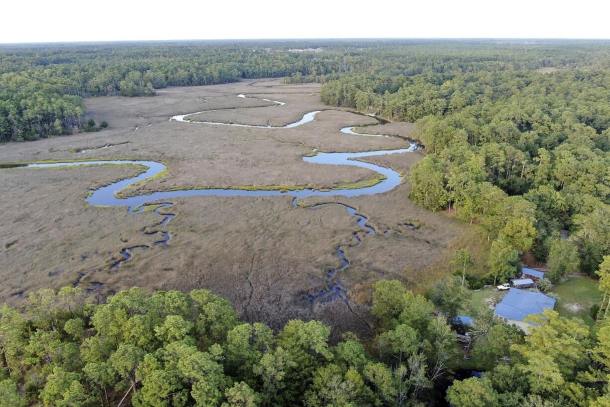 Homes surround wetlands in Oak Island, N.C., Tuesday, Aug. 29, 2023. The Biden Administration weakened protections for wetlands on Tuesday, a win for developers and agricultural groups in some states.