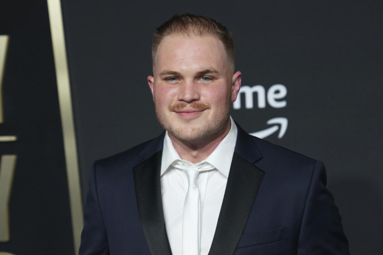 FILE - Zach Bryan arrives at the 58th annual Academy of Country Music Awards on Thursday, May 11, 2023, at the Ford Center in Frisco, Texas. Bryan says he was arrested and jailed briefly in northeastern Oklahoma. According to a post on his account on the social media site X, formerly Twitter, Bryan wrote that he had an incident with the Oklahoma Highway Patrol on Thursday night and said some things that were out of line because he was frustrated.