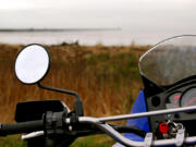 A Kawasaki KLR 650 is trailside and ready to roll.