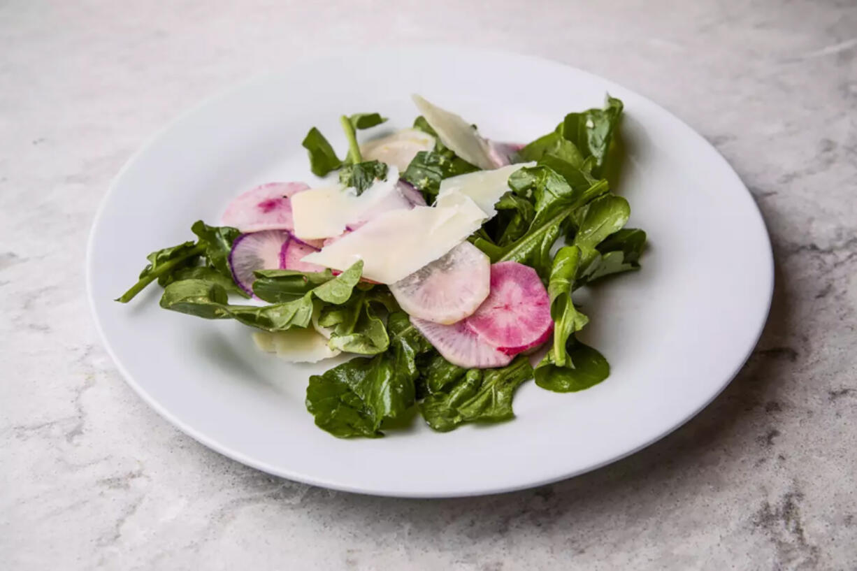 Big bowls of salad, teeming with vegetables and fruits and cheese, are ideal for easy end-of-summer cooking, like this Radish Salad With Lime and Parmesan. (Photos by Myung J.