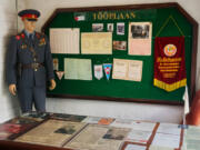 KGB agent uniform and desk with exhibition at the KGB Museum in Tallinn, Estonia.