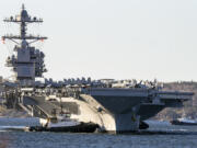 FILE - The USS Gerald R. Ford, one of the world's largest aircraft carriers, arrives in Halifax on Oct. 28, 2022. The Pentagon has ordered the Ford carrier strike group to sail to the Eastern Mediterranean to be ready to assist Israel, two U.S. officials said Sunday, Oct. 8, 2023. The USS Gerald R. Ford and its approximately 5,000 sailors and deck of warplanes will be accompanied by cruisers and destroyers in a show of force that is meant to be ready to respond to anything, from possibly interdicting additional weapons from reaching Hamas and conducting surveillance.