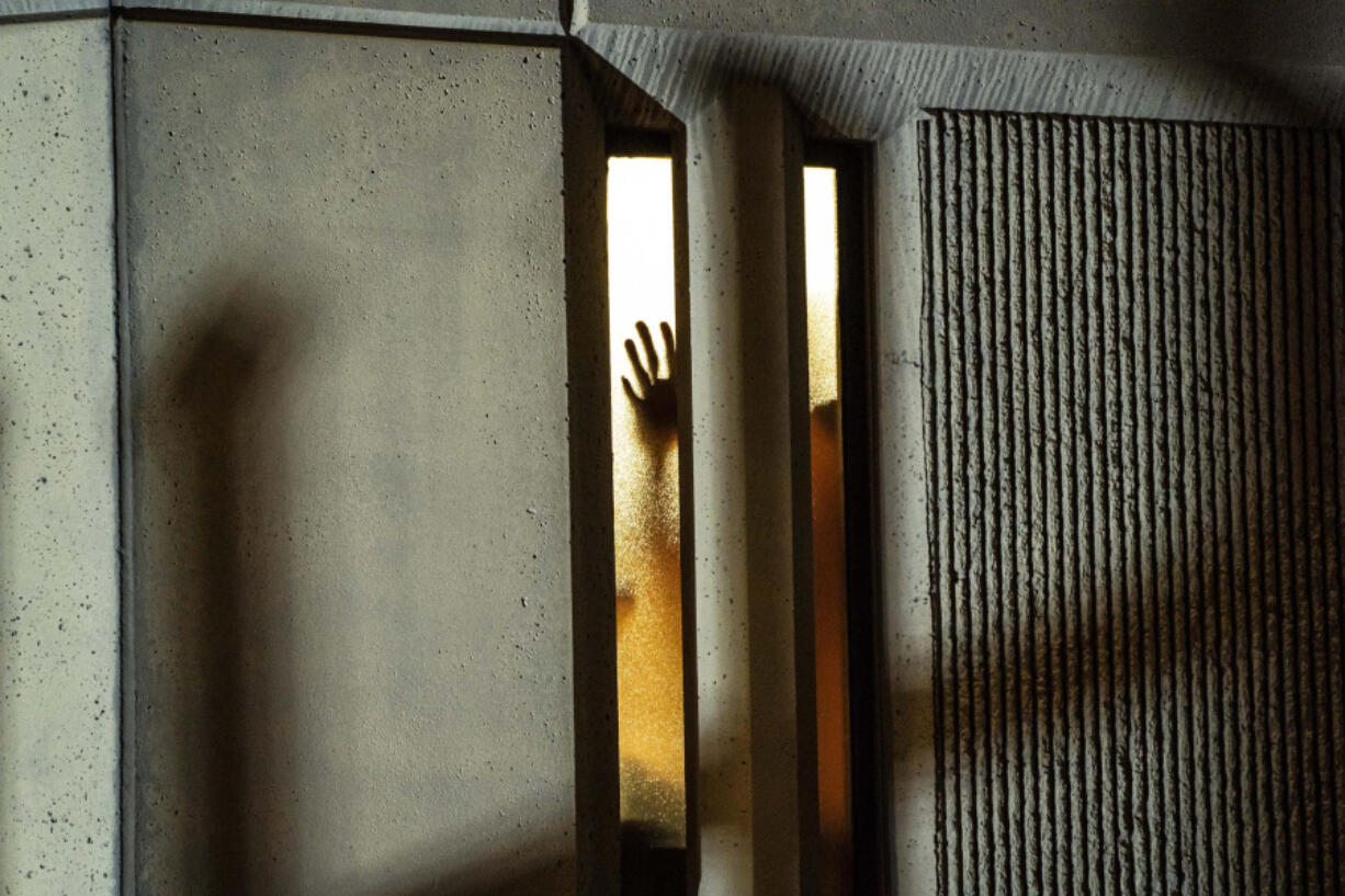 Demonstrators outside a jail facility during an anti-police protest on Jan. 24, 2021, in Tacoma, Washington. A multiyear investigation into conditions for transgender people in prisons in the state has led to a proposed settlement agreement which advocates say is among the strongest in the country for gender-affirming medical care in state prisons.