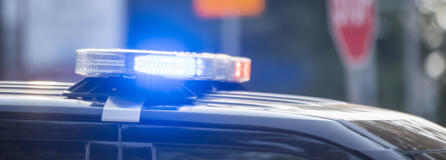 Police lights flash on the roof of a Vancouver police vehicle.