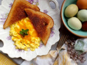 Scrambled eggs are the ultimate comfort food: easy to make and easy to eat (especially with cheddar cheese).