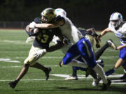 Evergreen's Amani Jackson runs the ball in a game against Mountain View at McKenzie Stadium on Friday, Sept. 29, 2023.