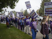 Service Employees International Union Local 49 union members strike outside Kaiser Permanente's Cascade Park Medical Office on Mill Plain Boulevard Wednesday morning.