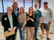 Sandy Conroy, far left, past Lions district governor and Fort Vancouver Lions Club member, inducted four new individuals into the Ridgefield Lions on Sept. 28. They are, left to right: Randy Mueller; Stacy Mueller; Joellene Skoog and John Skoog.