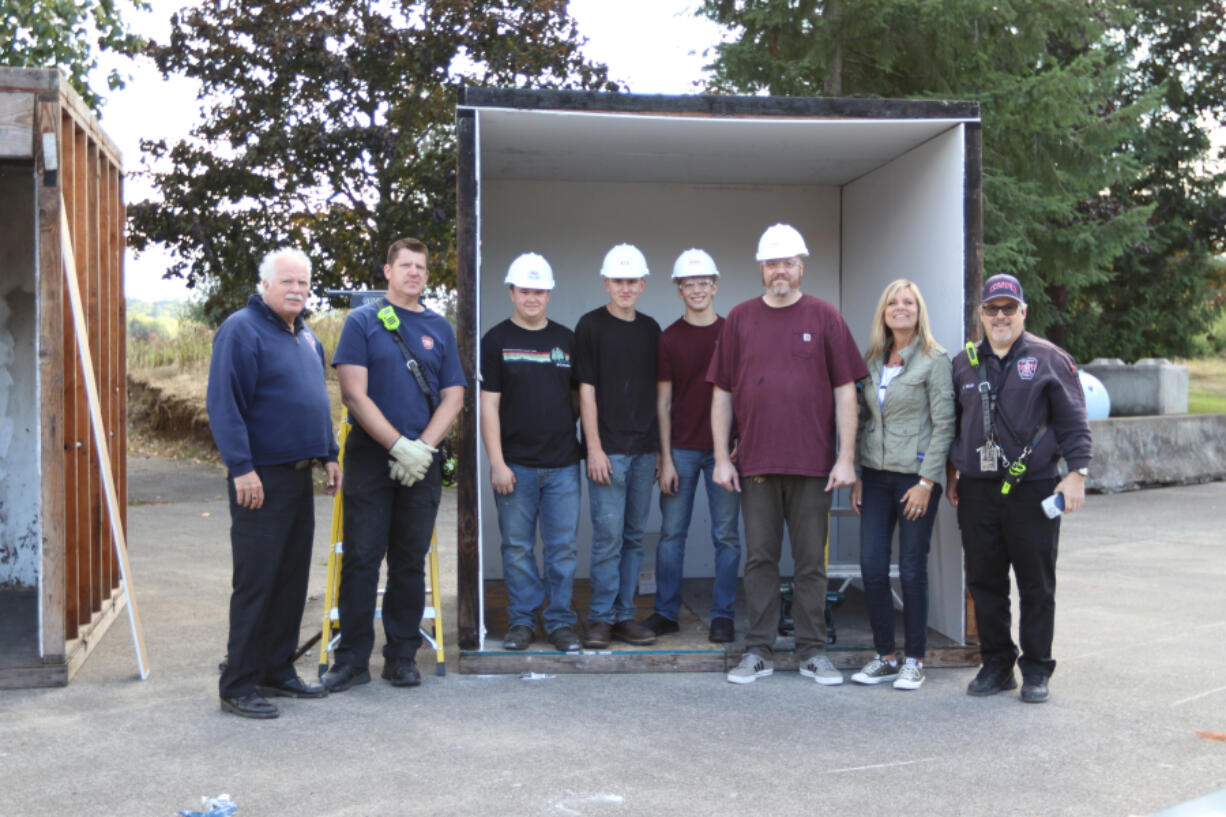 Washougal High School students applied construction skills learned in the classroom to build two prop rooms for a fire safety demonstration by the Camas-Washougal Fire Department.