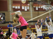 Prairie senior Ali Millspaugh goes for a kill against Kelso in volleyball match at Prairie High School on Monday, Oct. 9, 2023.