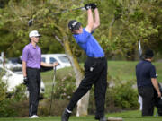 Grady Millar of Mountain View tees off on the No. 10 tee at Heron Lakes Golf Club Great Blue course at the Class 3A boys golf district tournament on Wednesday, Oct. 11, 2023.