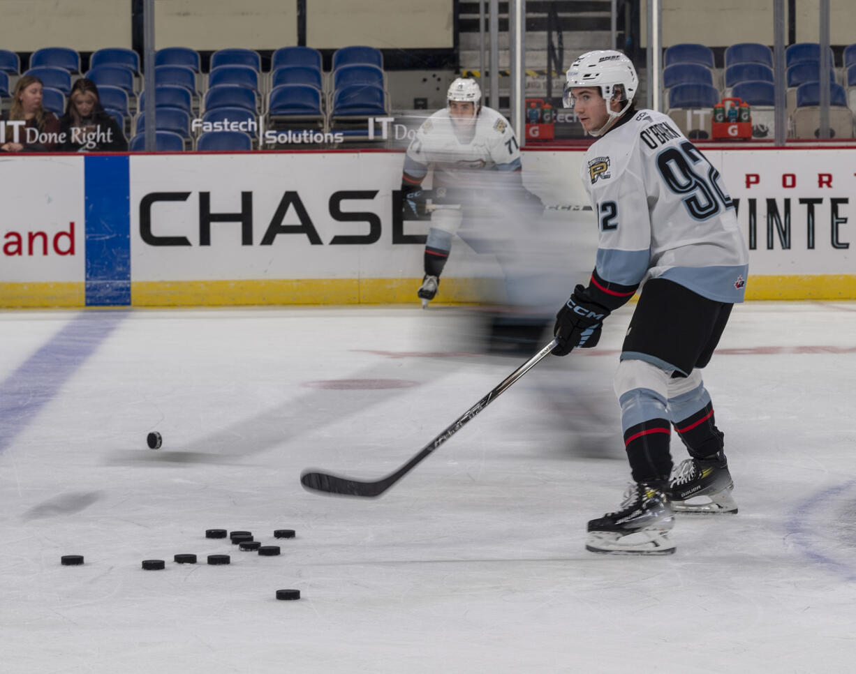 Portland Winterhawks forward Jack O'Brien watches as teammates skate by Wednesday, Oct. 18, 2023, before the Winterhawks’ 11-1 win against the Brandon Wheat Kings at Veterans Memorial Coliseum in Portland.