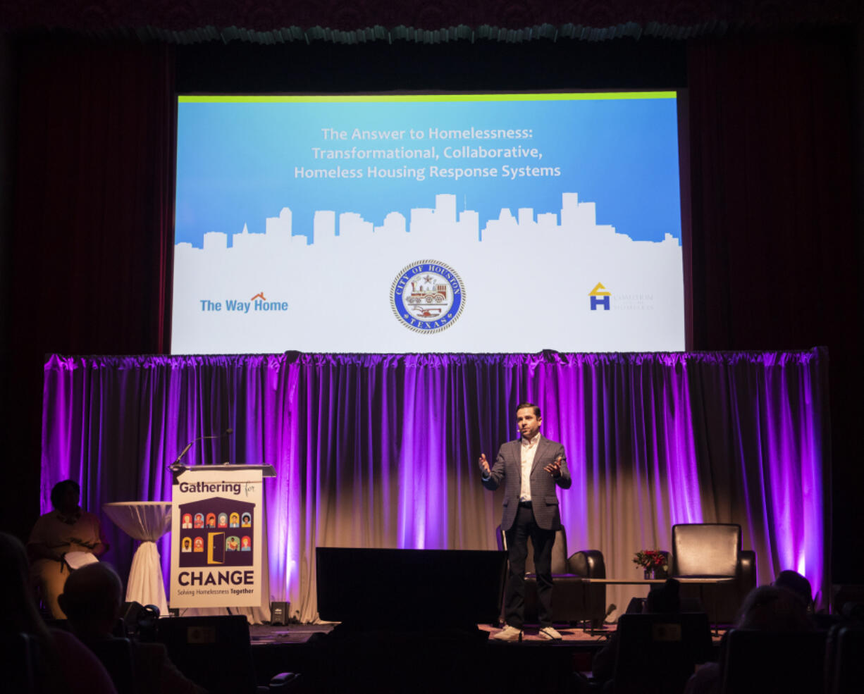 Marc Eichenbaum, special assistant to the mayor of Houston for homeless initiatives, speaks to a crowd Thursday about how Houston approaches solving homelessness during the Council for the Homeless "Gathering for Change" event at Kiggins Theatre in Vancouver.