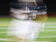 Skyview junior Gavin Packer runs with the football Friday, Oct. 20, 2023, during Skyview’s 49-10 win against Battle Ground at Kiggins Bowl.