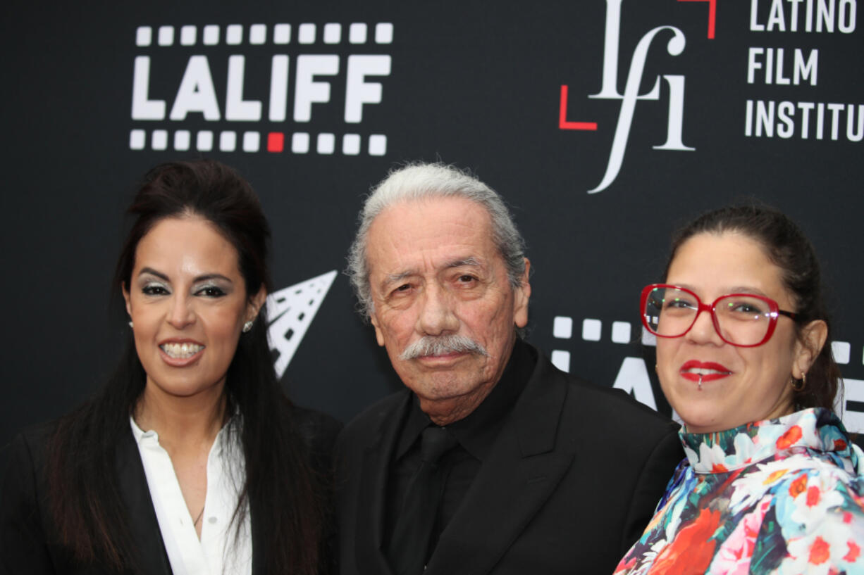 From left, Erika Sabel Flores, Youth Cinema Project Executive Director, Edward James Olmos, and LFI Founder & Board Chairman, and Diana Cadavid, Artistic Director, on the red carpet at the Los Angeles Latino International Film Festival, which Olmos co-founded, at the TCL Chinese Theatre in Hollywood on May 31, 2023. (Allen J.