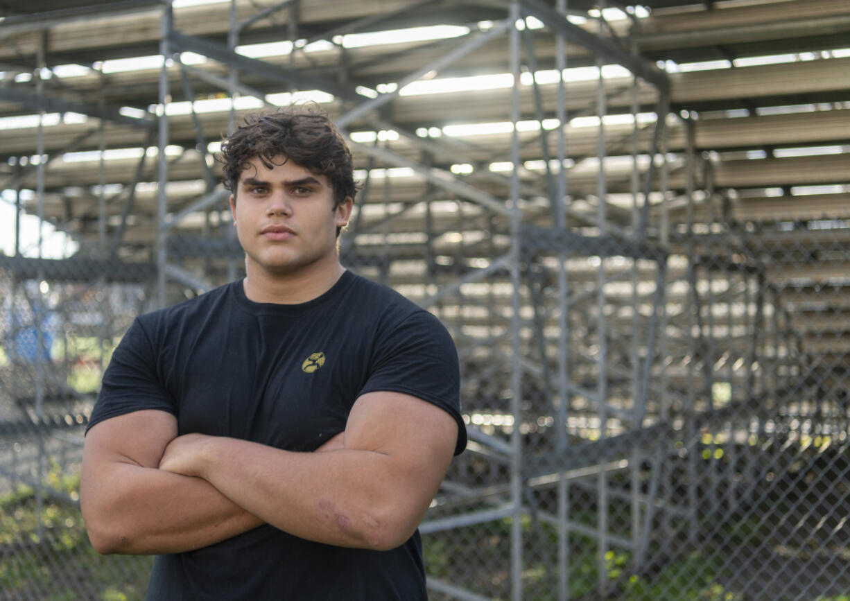 Washougal senior lineman Jose Alvarez-Cruze stands for a portrait Tuesday, Oct. 17, 2023, at Washougal High School. Alvarez-Cruze considered giving up football after suffering a head and neck injury in the last game of his junior season.