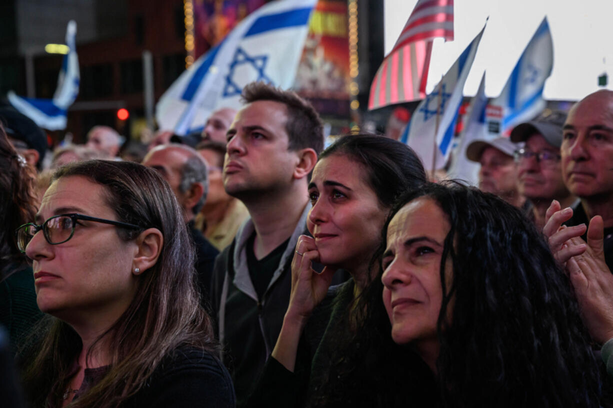 Members of the Jewish community and supporters of Israel attend a rally calling for the release of hostages held by Hamas, in Times Square, New York on Oct. 19, 2023.