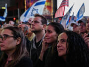 Members of the Jewish community and supporters of Israel attend a rally calling for the release of hostages held by Hamas, in Times Square, New York on Oct. 19, 2023.