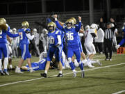 Kelso senior Hunter Williams (36) celebrates after forcing a fumble against Prairie that the Hilanders recovered during a 3A Greater St. Helens League tiebreaker at Doc Harris Stadium in Camas on Monday, Oct. 30, 2023.