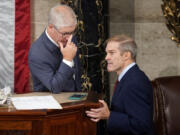 Temporary House leader Rep. Patrick McHenry, R-N.C., talks with Rep. Jim Jordan, R-Ohio, as Republicans try to elect Jordan in a second ballot to be the new House speaker, at the Capitol in Washington, Wednesday, Oct. 18, 2023.