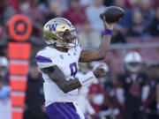 Washington quarterback Michael Penix Jr. passes against Stanford during the first half of an NCAA college football game in Stanford, Calif., Saturday, Oct. 28, 2023.