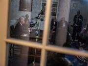 First lady Jill Biden, center, watches as President Joe Biden speaks from the Oval Office of the White House, Thursday, Oct. 19, 2023, in Washington, about the war in Israel and Ukraine.