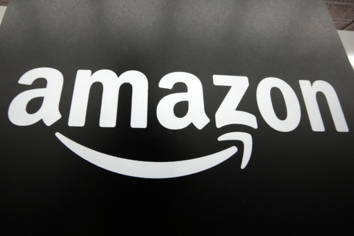 File - The Amazon logo is displayed at a Best Buy store in Pittsburgh on Jan. 23, 2023. The Federal Trade Commission's long-awaited antitrust case is the agency's most aggressive move yet to tame the market power of Amazon, a company that's become synonymous with online shopping and fast deliveries.(AP Photo/Gene J.