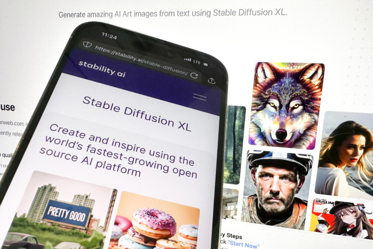 In this picture, the desktop and mobile websites for Stable Diffusion are seen, Tuesday, Oct. 24, 2023, in New York. Computer-generated child sexual abuse images made with artificial intelligence tools like Stable Diffusion are starting to proliferate on the internet and are so realistic that they can be indistinguishable from photographs depicting actual children, according to a new report.