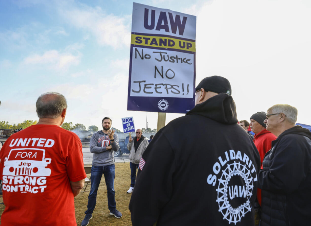 U.S. Sen. J.D. Vance, R-Ohio, visits striking United Auto Workers union members Friday outside the Stellantis Toledo Assembly Complex in Toledo, Ohio, where Jeeps are made.