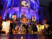 President Joe Biden and first lady Jill Biden give treats to trick-or-treaters on the South Lawn of the White House, on Halloween, Monday, Oct. 30, 2023.