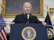 President Joe Biden speaks in the State Dining Room of the White House, Saturday, Oct. 7, 2023, in Washington, after the militant Hamas rulers of the Gaza Strip carried out an unprecedented, multi-front attack on Israel at daybreak Saturday.