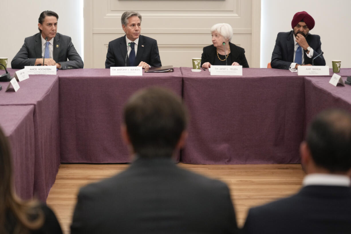 FILE - Secretary of State Antony Blinken, second from left, participates in global infrastructure and investment forum with Amos Hochstein, left, senior advisor to the president on energy and and investment, Janet Yellen, second from right, United States Secretary of Treasury, and Ajay Banga, right, World Bank president, in New York, Sept. 21, 2023. Economic crises are rippling through the countries bordering Israel.