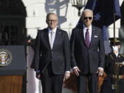 President Joe Biden welcomes Australia's Prime Minister Anthony Albanese during a State Arrival Ceremony on the South Lawn of the White House in Washington, Wednesday, Oct. 25, 2023.