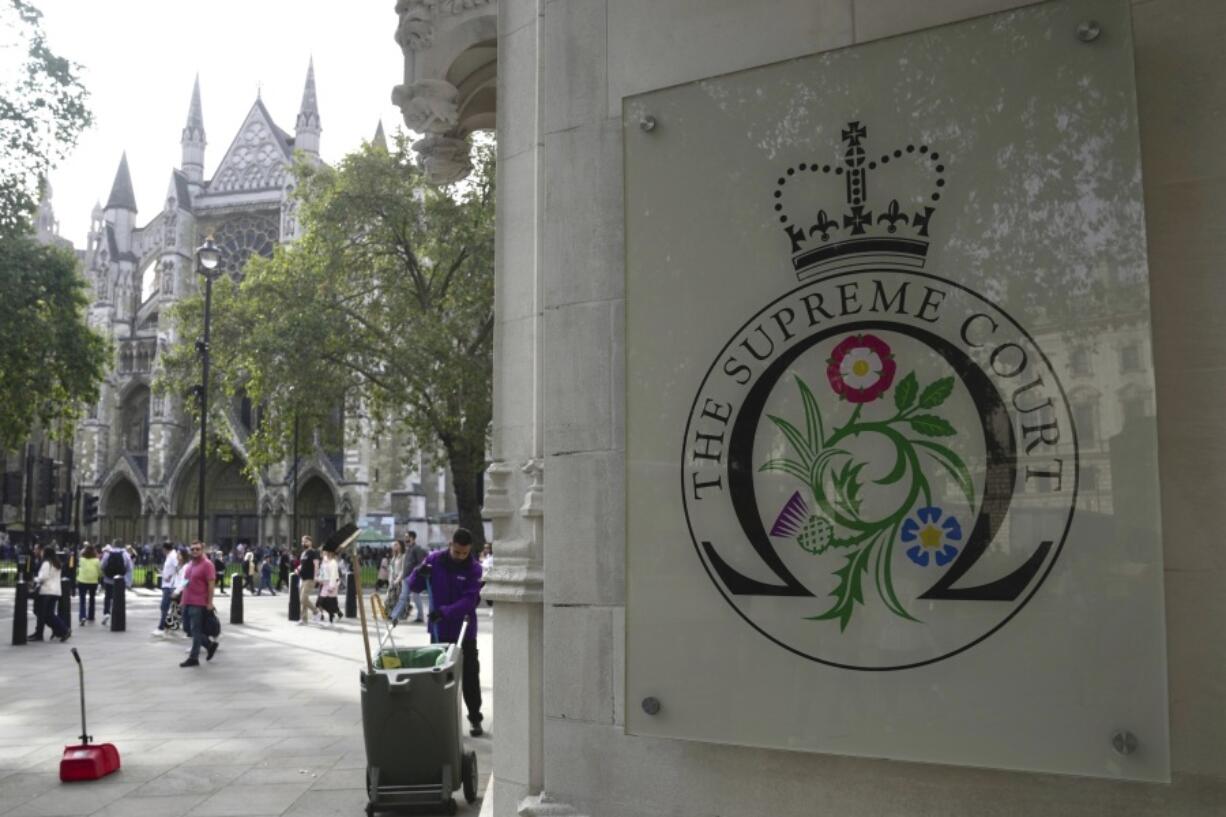 A view of the entrance of the Supreme Court, in London, Monday, Oct. 9, 2023. The U.K. Supreme Court start hearing arguments over whether the British government's contentious policy to send asylum-seekers to Rwanda is lawful.