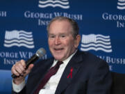 Former President George W. Bush speaks during an event to mark the 20th anniversary year of the President's Emergency Plan for AIDS Relief (PEPFAR) at the U.S. Institute of Peace in Washington, Feb. 24, 2023. As billions of dollars for a global HIV/AIDS program credited with saving millions of lives remains in limbo, the George W. Bush Institute is urging the U.S. Congress to keep money flowing for it. In a letter sent to Congress on Oct. 25, the former Republican president's institute pleaded with Congress to keep funding PEPFAR. (AP Photo/J.