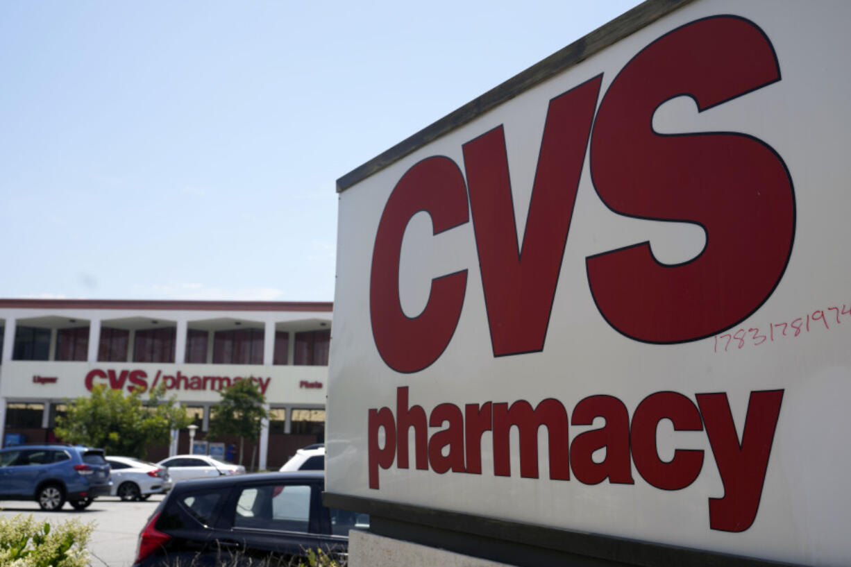 FILE - A sign marks a CVS branch on Tuesday, May 16, 2023, in Pasadena, Calif.  CVS Health is pulling from its drugstore shelves, Friday, Oct. 20,  some cough-and-cold treatments that contain an ingredient that has been deemed ineffective by doctors and researchers.