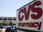 FILE - A sign marks a CVS branch on Tuesday, May 16, 2023, in Pasadena, Calif.  CVS Health is pulling from its drugstore shelves, Friday, Oct. 20,  some cough-and-cold treatments that contain an ingredient that has been deemed ineffective by doctors and researchers.