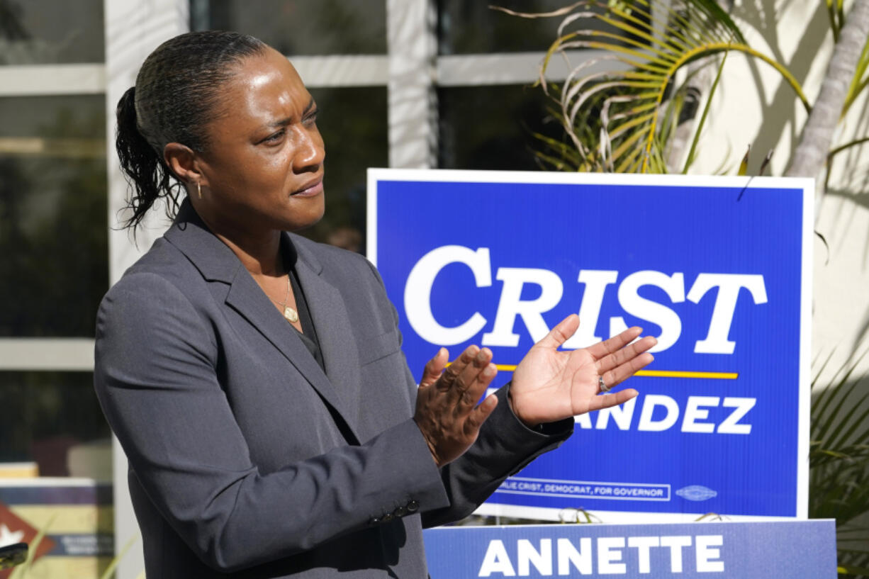 FILE - Laphonza Butler, president of EMILY's List, listens during a rally held by the Latino Victory Fund, Oct. 20, 2022, in Coral Gables, Fla. A spokesman in California Gov. Gavin Newsom's office said on Sunday, Oct. 1, 2023, that he will name Butler to the Senate seat of the late Dianne Feinstein.