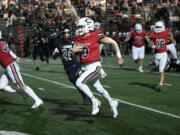 Camas quarterback Jake Davidson runs downfield in the Papermakers’ 52-27 win over Union at McKenzie Stadium on Friday, Oct. 20, 2023.