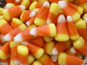 This image shows a pile of candy corn in Westchester County, N.Y. on Oct. 23, 2023. Cruel joke for trick-or-treaters or coveted seasonal delight? The great Halloween debate over candy corn is on.