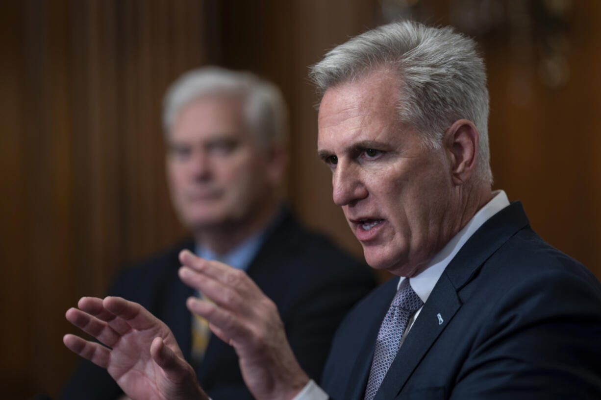 Speaker of the House Kevin McCarthy, R-Calif., joined by Majority Whip Tom Emmer, R-Minn., holds a news conference just after the House approved a 45-day funding bill to keep federal agencies open, but the measure must first go to the Senate, at the Capitol in Washington, Saturday, Sept. 30, 2023. (AP Photo/J.