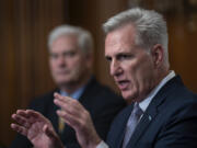 Speaker of the House Kevin McCarthy, R-Calif., joined by Majority Whip Tom Emmer, R-Minn., holds a news conference just after the House approved a 45-day funding bill to keep federal agencies open, but the measure must first go to the Senate, at the Capitol in Washington, Saturday, Sept. 30, 2023. (AP Photo/J.